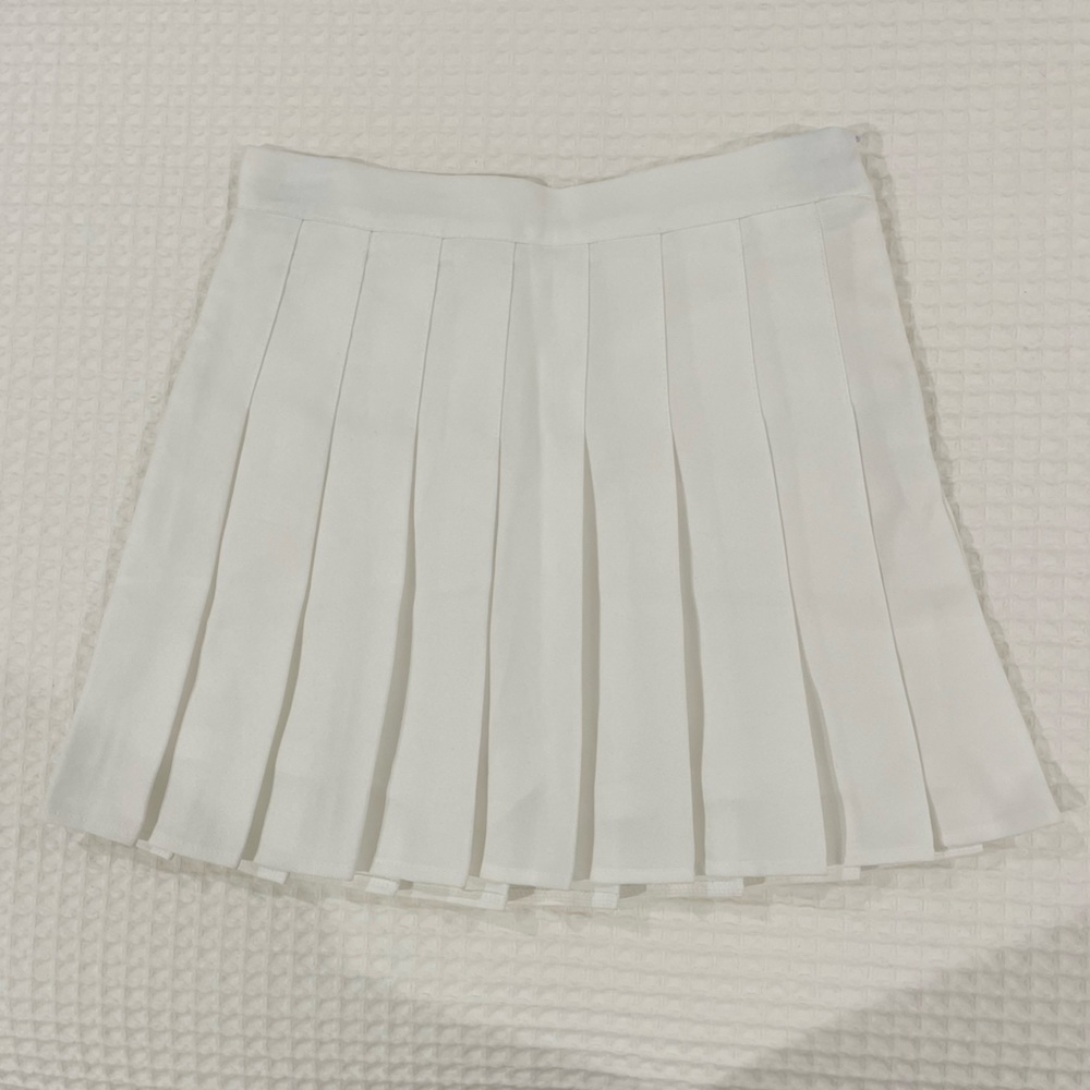White pleaded tennis skirt
